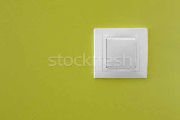 Villanykapcsoló egyszerű zöld fal háttér energia Stock fotó © iko