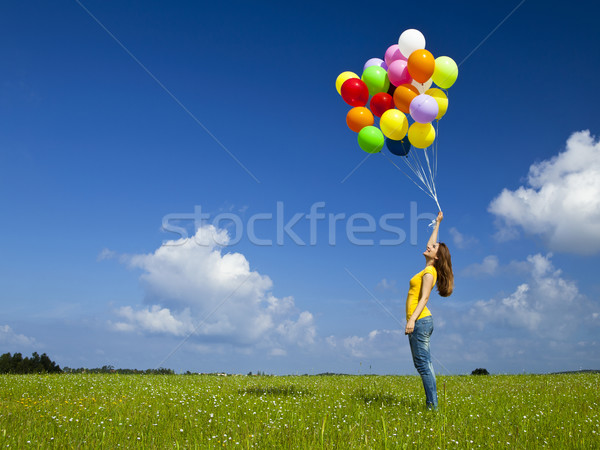 Kız renkli balonlar mutlu genç kadın yeşil Stok fotoğraf © iko