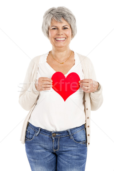 Holding a heart in her hands Stock photo © iko