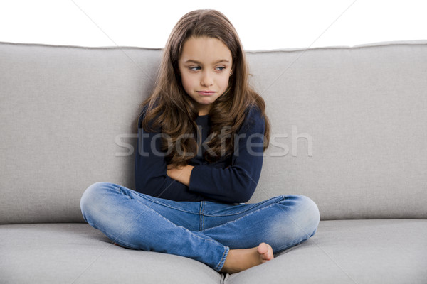 расстраивать девочку сидят диване что-то детей Сток-фото © iko