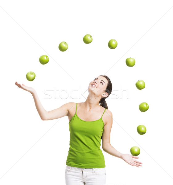 Woman throwing apples Stock photo © iko