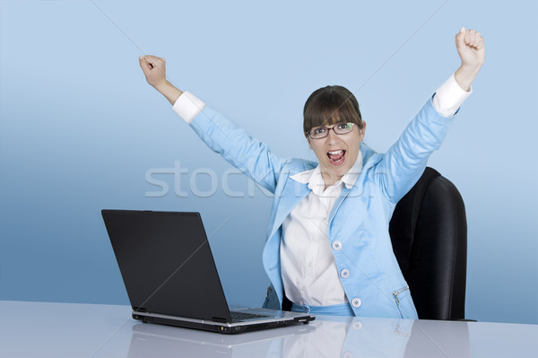 Stockfoto: Zakenvrouw · gelukkig · werken · laptop · Blauw · vrouw
