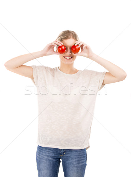 Stock photo: Beaitiful woman with tomatos in front of the face