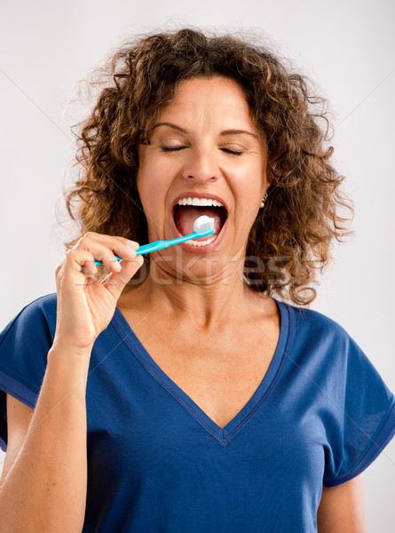 Stock photo: Brush my teeths and keep my beautiful smile