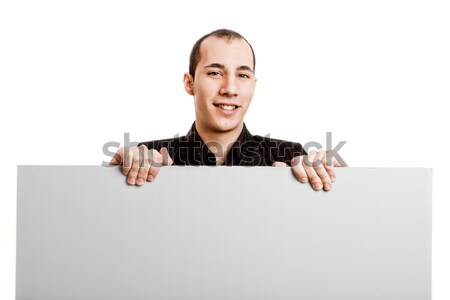 üzletember mutat valami tart óriásplakát izolált Stock fotó © iko