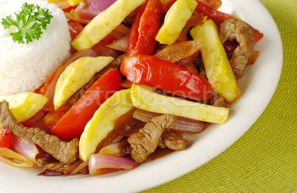 Peruvian Dish Called Lomo Saltado Stock photo © ildi