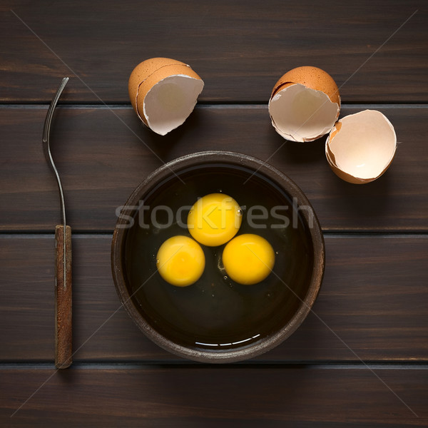 Eier erschossen drei rustikal Schüssel Stock foto © ildi