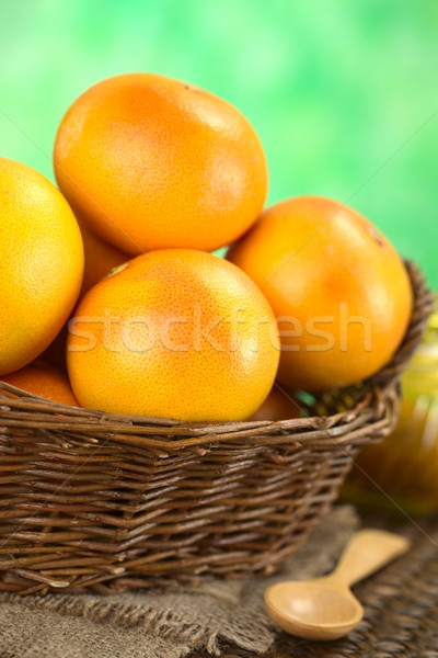 籃 粉紅色 選擇性的重點 集中 柚子 圖像 商業照片 © ildi