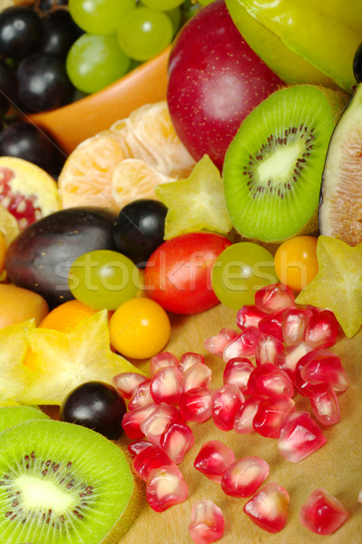 Egzotikus gyümölcsök fa deszka nagy választék gyümölcs Stock fotó © ildi