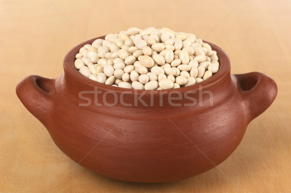 Raw Navy Beans in Rustic Bowl Stock photo © ildi