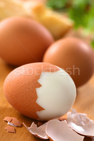 Főtt tojások friss kagyló vmi mellett fa deszka Stock fotó © ildi