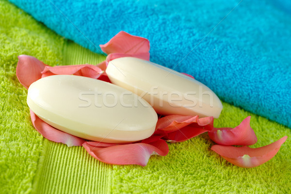 Bath Towels with Soaps and Rose Petals Stock photo © ildi