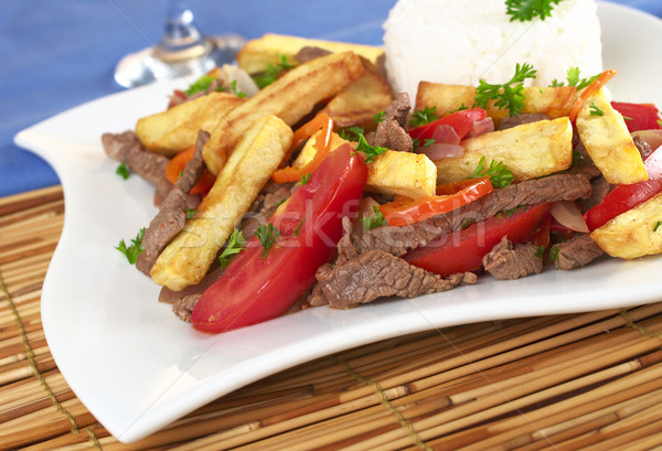 Peruvian Dish Called Lomo Saltado Stock photo © ildi