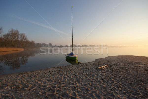 Small Boat in Morning Light Stock photo © ildi