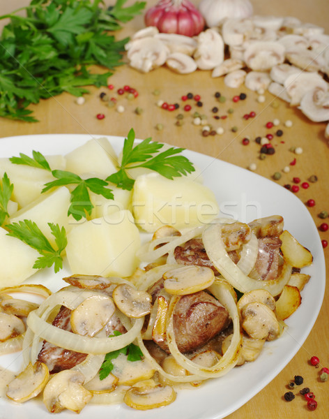 Stock photo: Fillet with Mushroomgravy and Onions