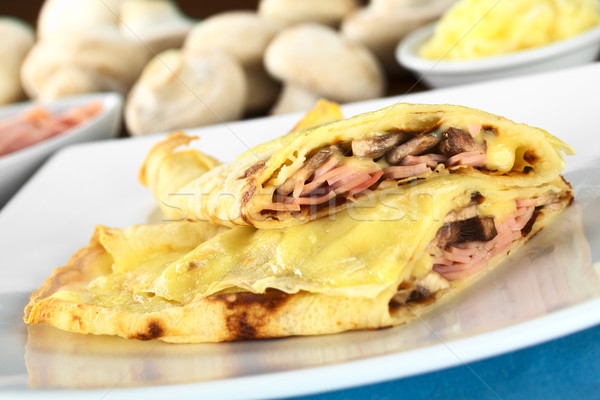 Crepes filled with ham, cheese and mushroom Stock photo © ildi