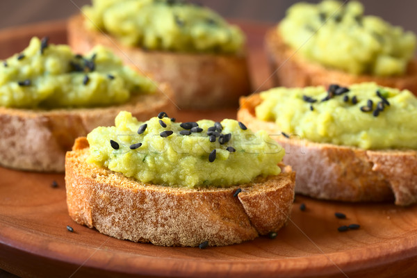 Bread with Green Pea Spread and Sesame Seeds Stock photo © ildi