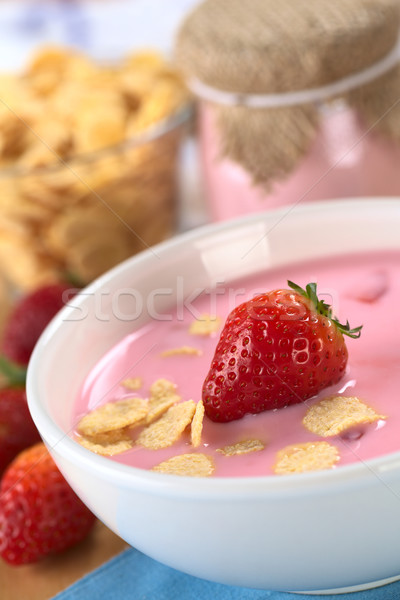 Stock photo: Strawberry Yogurt with Corn Flakes