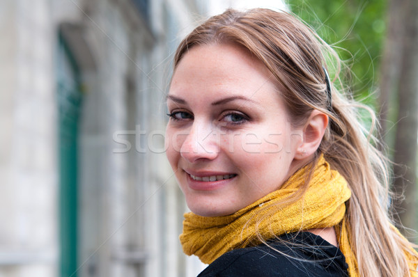 woman smiling while looking back  Stock photo © ilolab