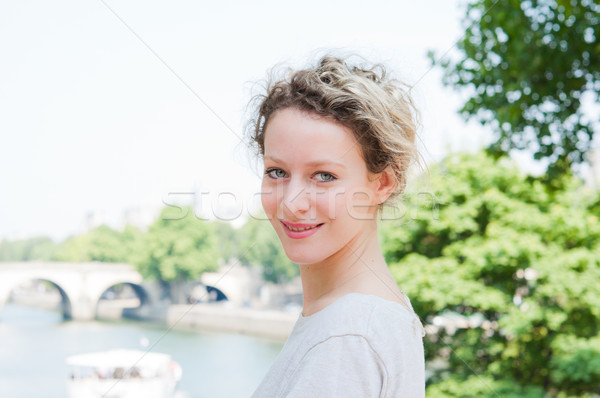 woman smiling while looking back  Stock photo © ilolab