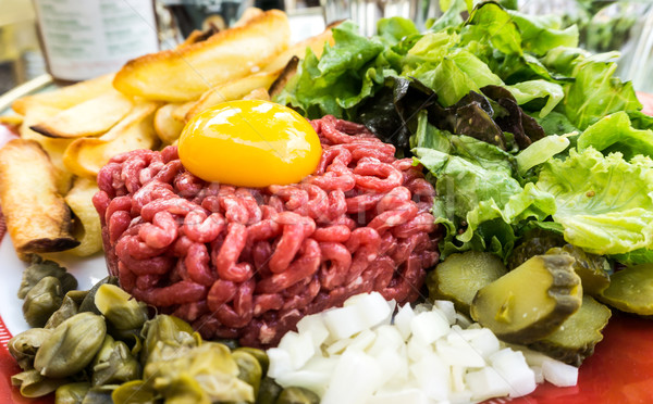 tasty Steak tartare (Raw beef) - classic steak tartare on white  Stock photo © ilolab