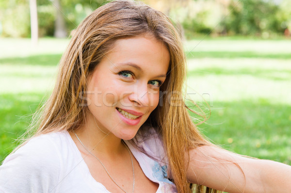 beautiful young attractive woman outdoors portrait on green back Stock photo © ilolab
