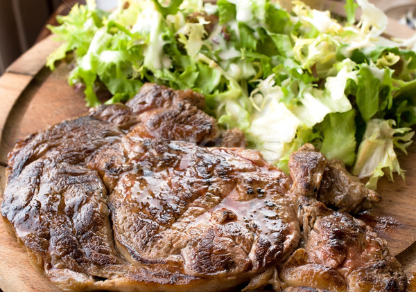 Grillowany stek mięso z grilla tablicy hot sauce Zdjęcia stock © ilolab