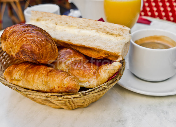 Breakfast with coffee and croissants in a basket on table Stock photo © ilolab