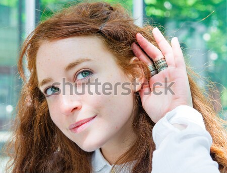 Stock photo: Relying on hand-ear listening the Good news