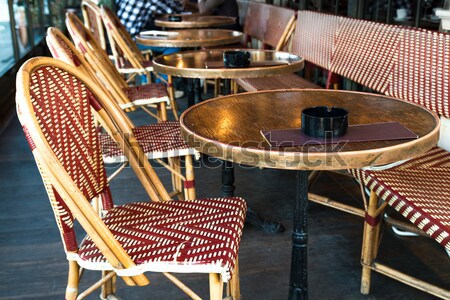 Street view of a Cafe terrace with empty tables and chairs,paris Stock photo © ilolab