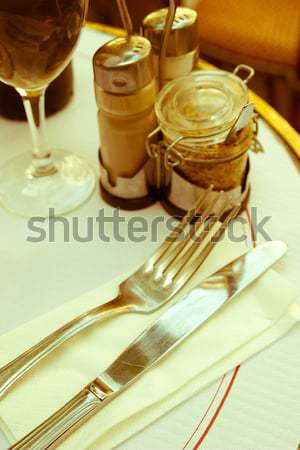 place setting - plate, knife and fork on table Stock photo © ilolab