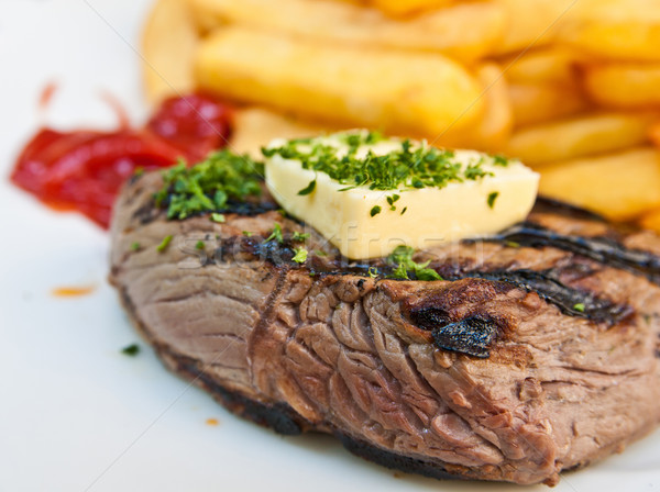 Stock photo: juicy steak beef meat with tomato and french fries 