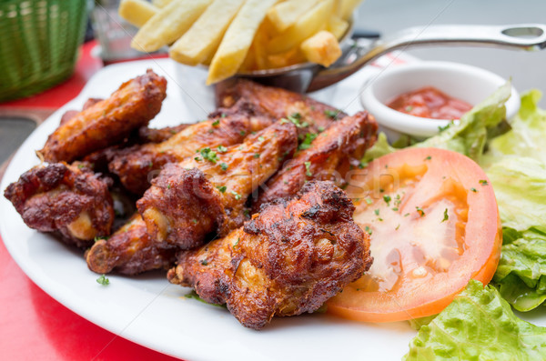 Chicken wings with sauce Stock photo © ilolab