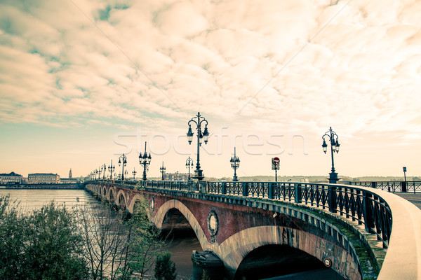 Bordeaux river bridge with St Michel cathedral Stock photo © ilolab