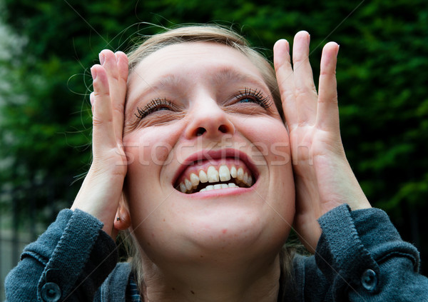 Stock photo: Young woman screaming with crazy expression 