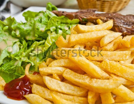 juicy steak beef meat with tomato and french fries  Stock photo © ilolab