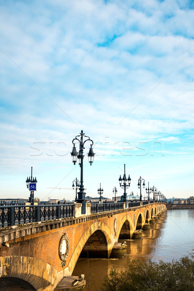 Bordeaux river bridge with St Michel cathedral Stock photo © ilolab