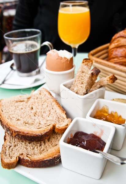 Breakfast with orange juice and fresh fruits on table Stock photo © ilolab