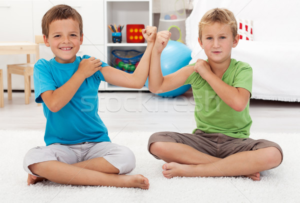 Boys showing their biceps Stock photo © ilona75