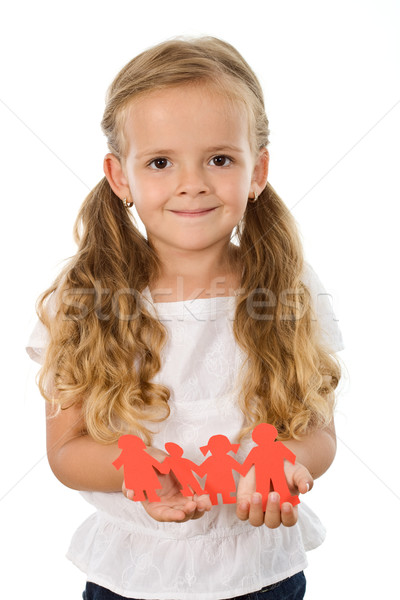Little girl holding paper people family Stock photo © ilona75
