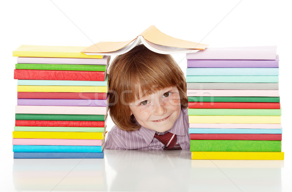 Schooljongen kleurrijk boeken ondeugend kind tabel Stockfoto © ilona75