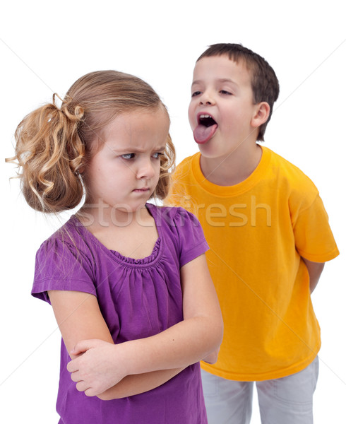 Upset little girl bullied by older boy Stock photo © ilona75