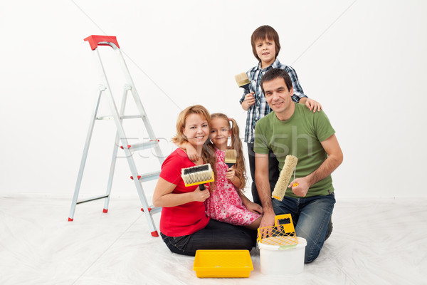 Feliz a la gente pintura casa familia mujer ninos Foto stock © ilona75
