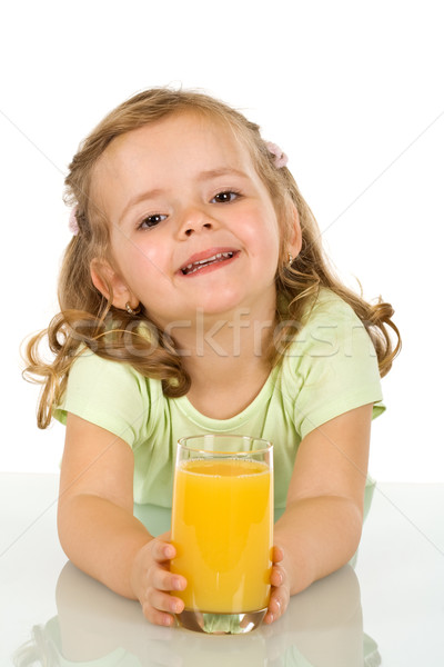 Little girl with fruit juice Stock photo © ilona75