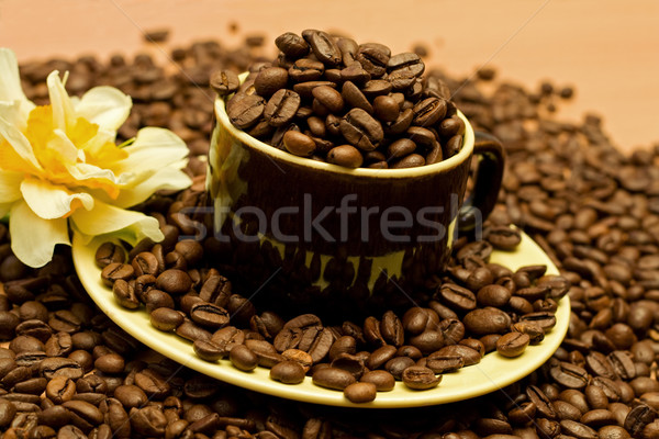 Cup of coffee full of beans Stock photo © ilona75