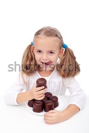Little girl with a sweet tooth Stock photo © ilona75