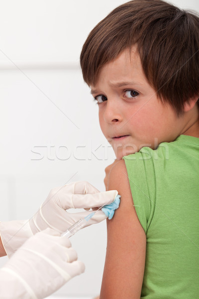 Boy receiving injection Stock photo © ilona75