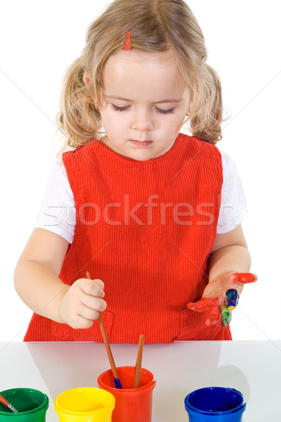 Little painter girl absorbed by the work Stock photo © ilona75