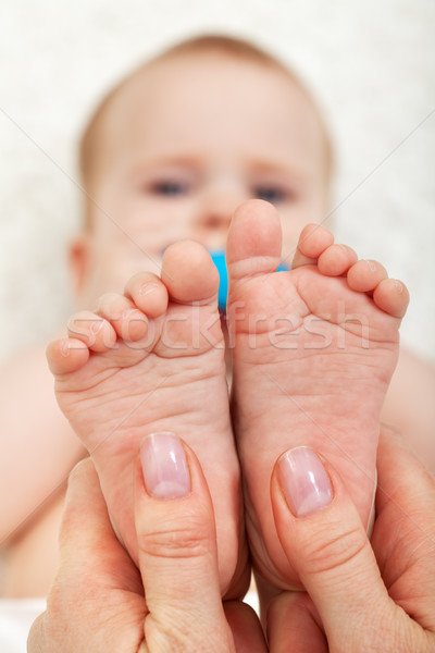 Baby feet massage Stock photo © ilona75