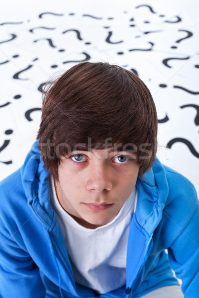Stock photo: Teenager boy with questions